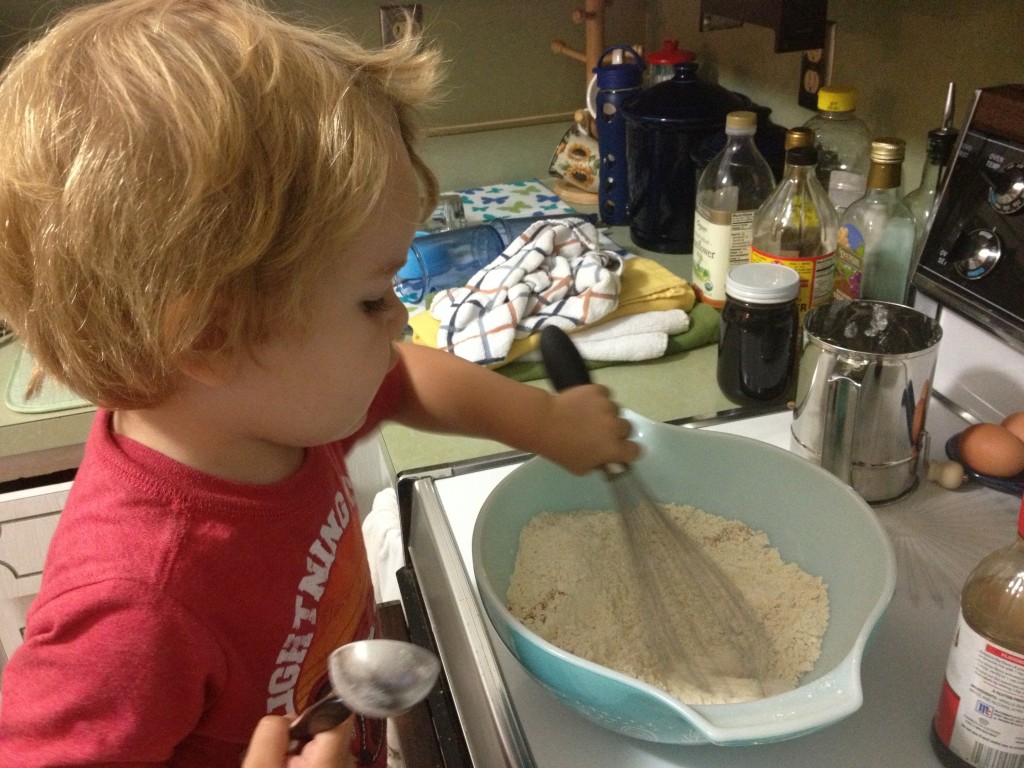 Andrew helping make waffles