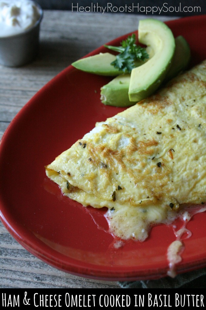 Simple ham & cheese omelet  cooked in basil butter