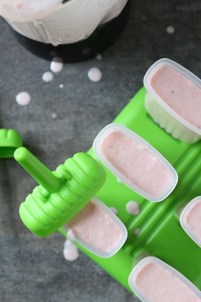 Simple homemade strawberry coconut popsicles. Refreshing and so yummy!