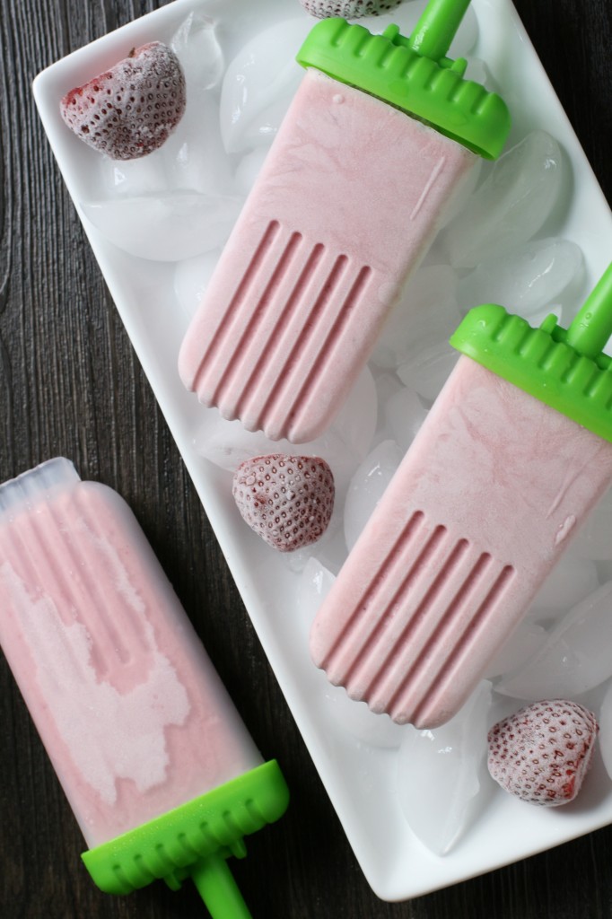 Simple homemade strawberry coconut popsicles. Refreshing and so yummy!