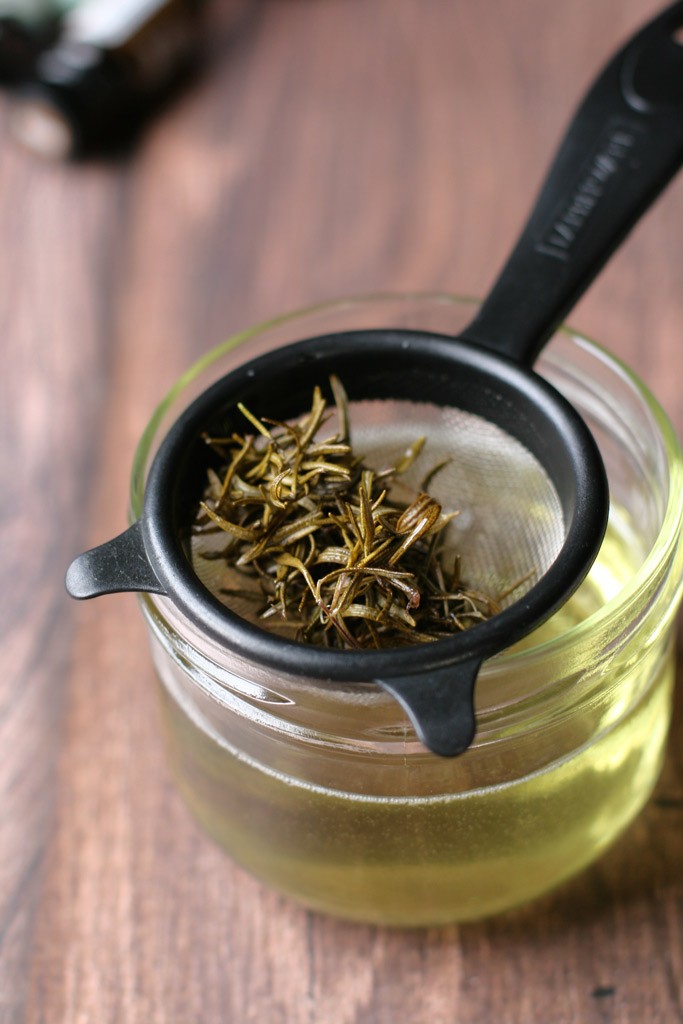 Suffering from dandruff? Try this DIY rosemary infused coconut oil dandruff treatment; it's loaded with natural ingredients that fight off dandruff. You will also learn about why you may be experiencing dandruff, too.