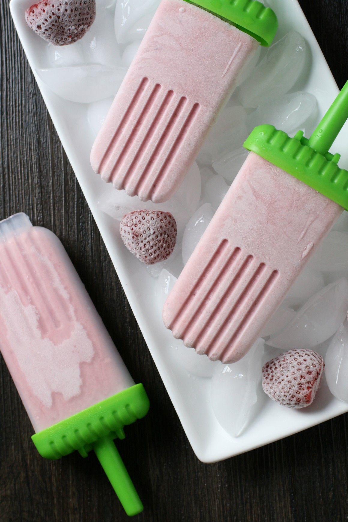 Homemade coconut strawberry popsicles! Great for a summertime snack to cool down!
